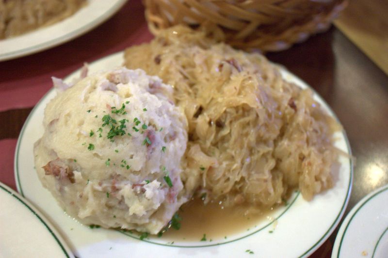 Schnitzel haus potato and sauerkraut