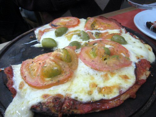 Guerrin olive ham tomato pizza