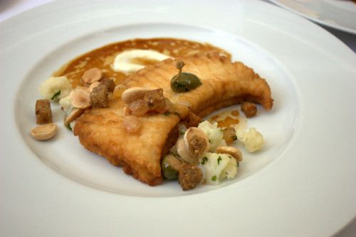 Eleven madison park skate with capers, cauliflowers, almonds