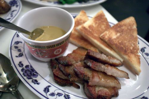 Fatty 'cue coriander bacon with yellow curry custard