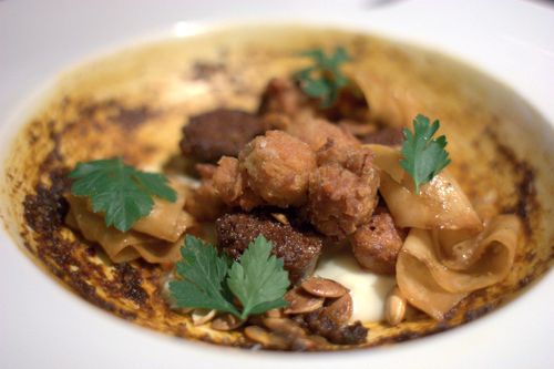 Empellon cocina lamb sweetbreads with longaniza, parley root, salsa papanteca