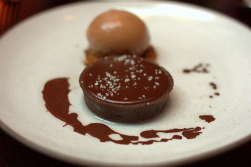 The nomad chocolate tart with caramel, hazelnut, fleur de sel